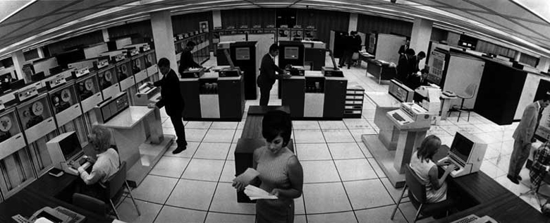 Eastern Airlines employees track reservations and ticketing with a computer. July 30, 1968. Miami News Collection, HistoryMiami. 1989-011-5158.