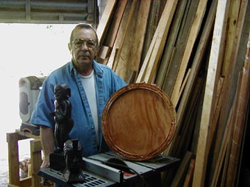 Manuel Dominguez with opón Ifá at Yemaya Products Botanica, Hialeah. Photograph by Miguel Ramos.
